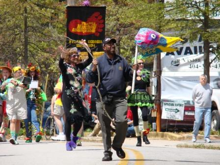 Greg White leading the Puppet Parade
