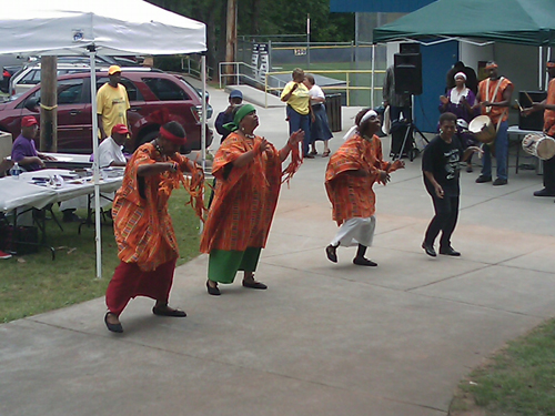 Keenagers perform an African dance