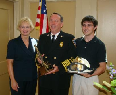 Chief Malone with his Wife Sherry and Son Chris